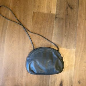 Grey faux leather side body purse.